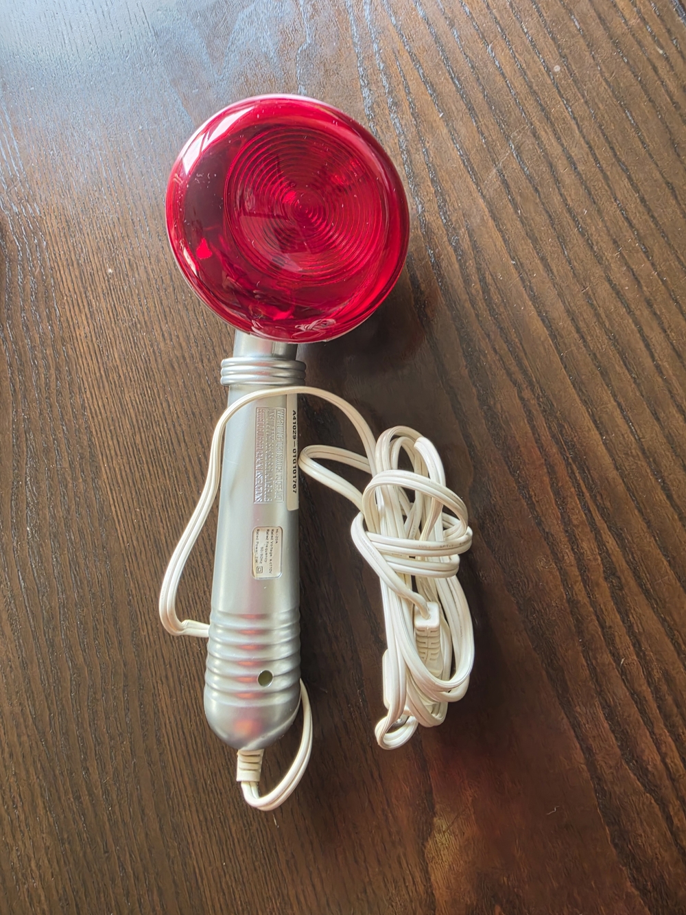 Red Heat Lamp with Handheld Silver Handle